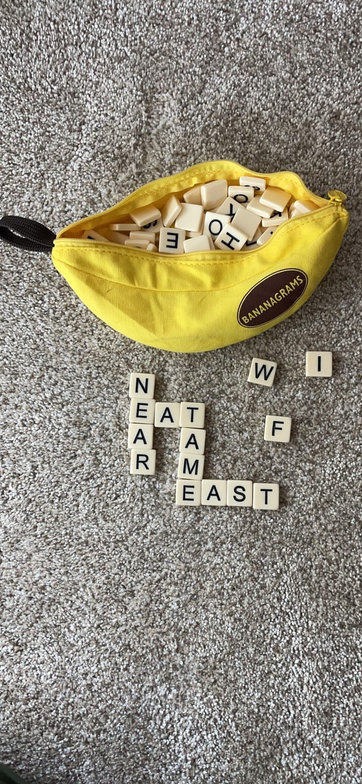 Bananagrams Classic Word Game, 144 Tiles in Banana Pouch, Travel Game customer photo 1