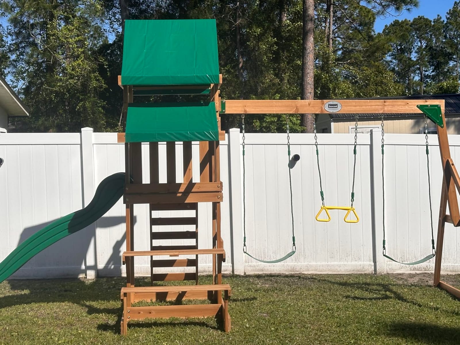 Backyard Discovery Belmont Cedar Wood Swing Set with Wave Slide, Play Deck, Rock Wall Ladder, Snack Bar Window, Shaded Picnic Area, Bench, Belt Swings, Trapeze, Sandbox Area, Canopy, Outdoor Playset customer photo 1