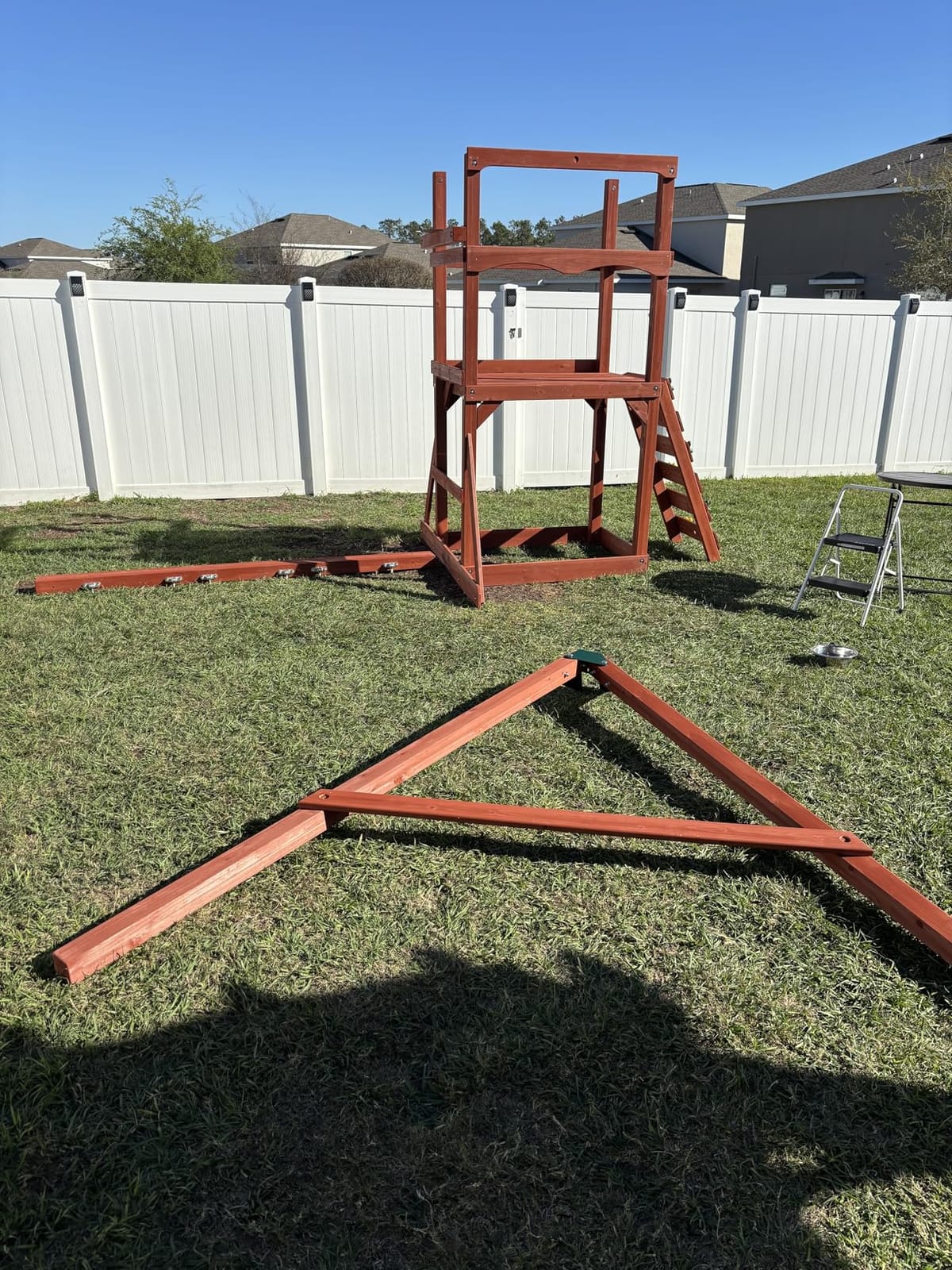 Gorilla Playsets Playmaker Deluxe Wooden Swing Set with Vinyl Canopy Roof, Dual Wave Slides, and Rock Climbing Wall, Redwood Stained Cedar customer photo 1