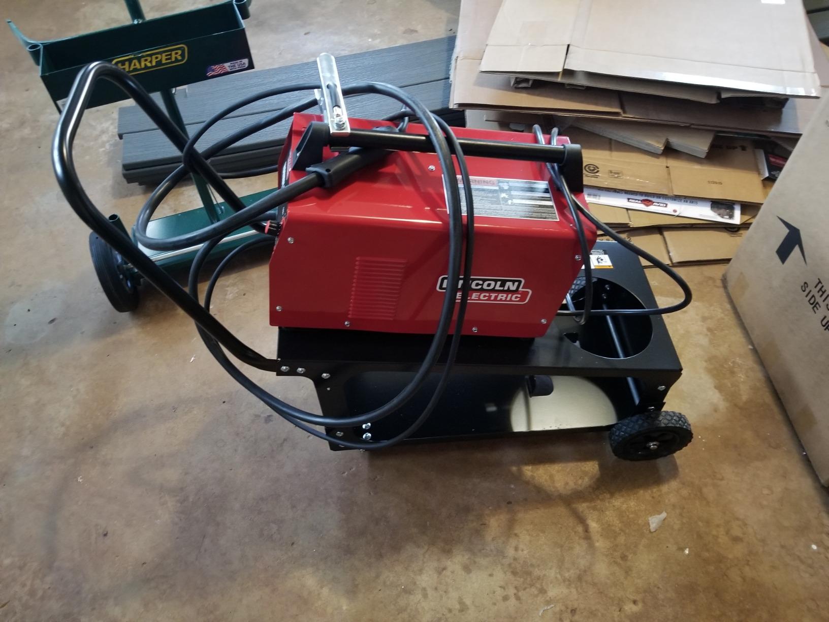 Lincoln Electric Welding Cart K2275-3, Easy Transport for Welder, 80 Cu Ft Gas Cylinder, Weld Cables and Accessories, Dual Tier with Angled Top Shelf, Two Wheels, Heavy Duty Steel, Black, 14 customer photo 1